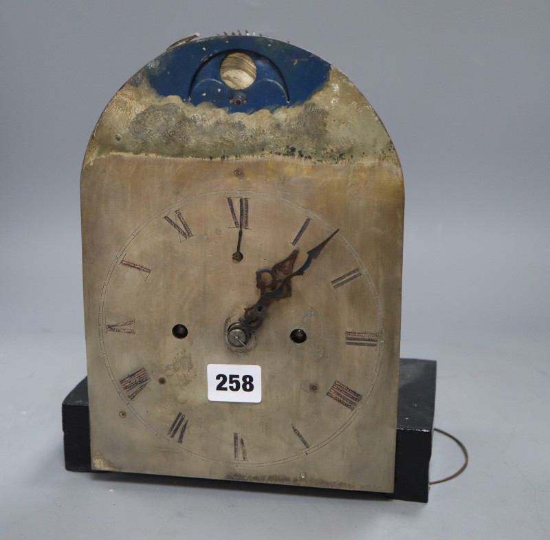A small longcase clock movement with moon face, height 26cm
